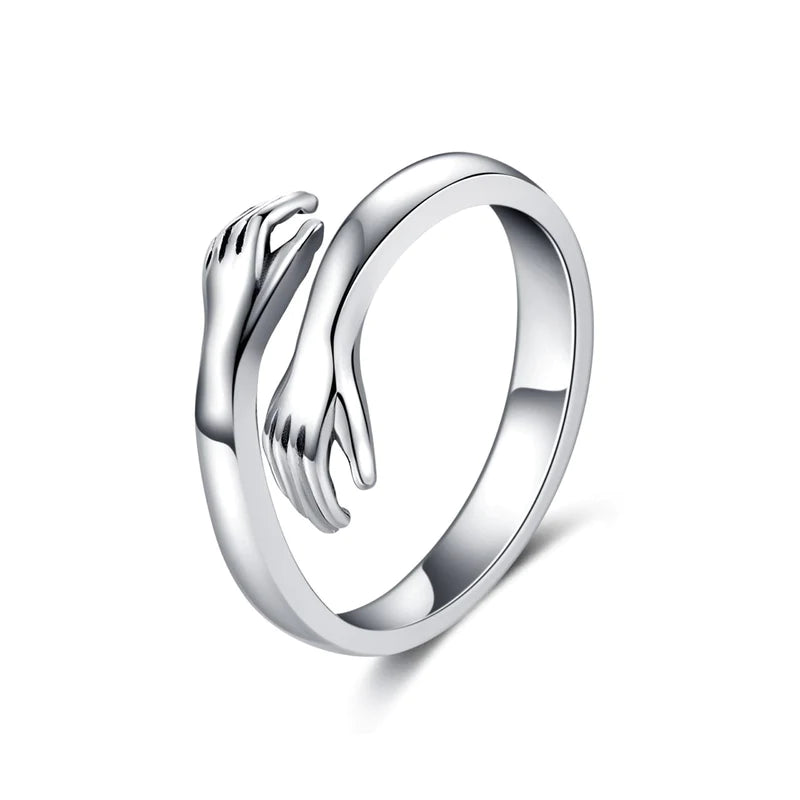 Couple hug best sale ring sterling silver